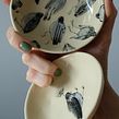 Illustrated dinnerware. Un proyecto de Cerámica e Ilustración infantil de Nastia Calaca - 10.01.2022