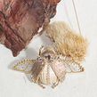 Embroidered beetles. Een project van Craft, Borduurwerk, Ontwerp van accessoires y Sieradenontwerp van Claire de Waard - 27.06.2022