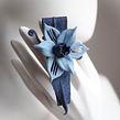 Spring Daffodil brooch in denim. Textile Design, Textile D, eing, and Fashion Design project by Svetlana Faulkner - 02.28.2024