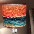 Wet Felted Landscape Lampshades. Un proyecto de Diseño textil, Tejido, Diseño de iluminación y Artesanía de Natasha Smart - 30.07.2024