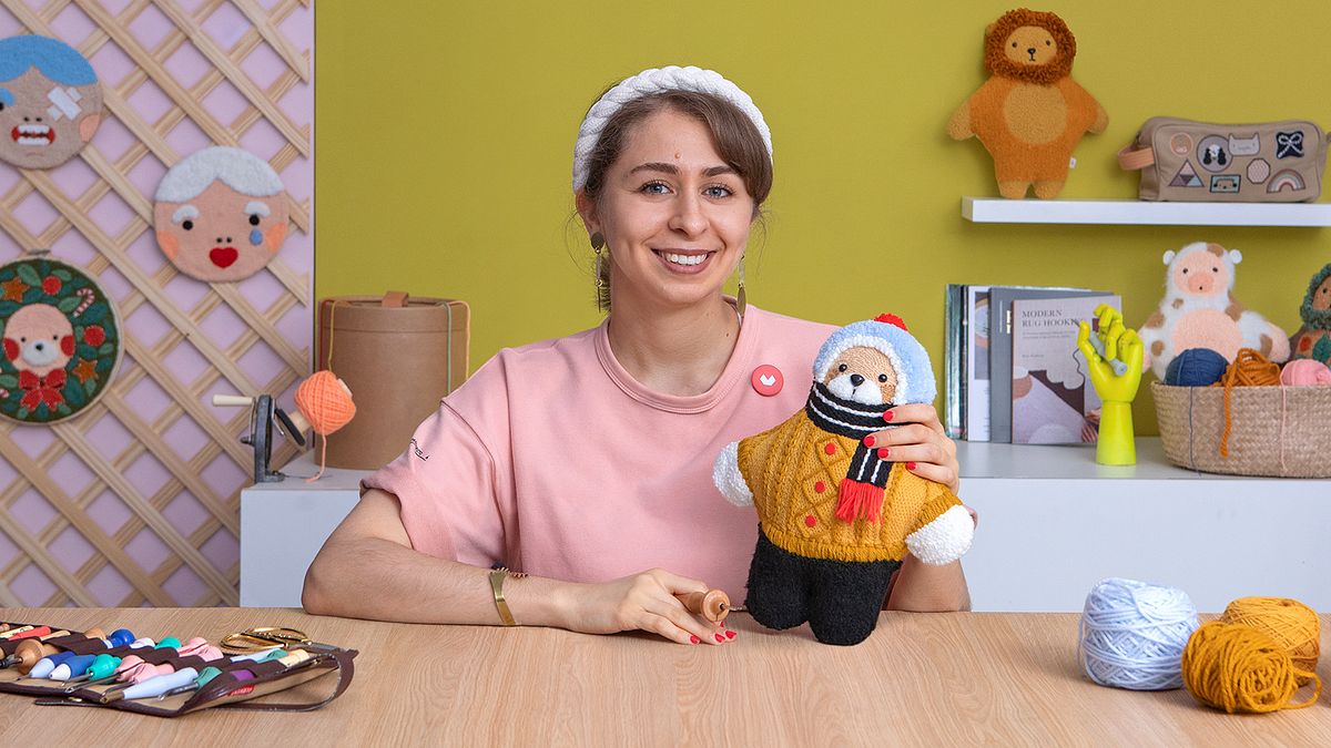 Design e bordado de bonecos com agulha mágica