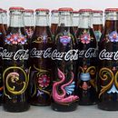 Botellas de Coca Cola. Un proyecto de Br, ing e Identidad, Pintura y Publicidad de Alfredo Genovese - 21.01.2017