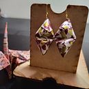 My project for course: Paper Jewelry-Making with Origami Techniques . % theindieenby tarafından hazırlanan Aksesuar Tasarımı, Sanat ve El Sanatları, Mücevher Tasarımı, Kağıt El Sanatları, Moda Tasarımı, Ve Kendin Yap projesi - 10.30.2022