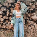Cardigan Warmi. Fiber Arts, Knitting, Design, Costume Design, and Fashion Design project by Javiera Ortiz - 11.21.2022