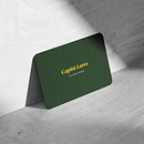 Aplicação da logotipo (Capitú Lares)  em cartão de visita . Un progetto di Design di marcos_25db - 28.11.2022