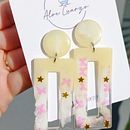 Diseño de Joyería en Resina. Un proyecto de Diseño, Diseño de jo y as de Ariana Soleil Romero Luque - 16.06.2023