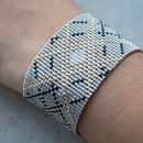 Mi proyecto del curso: Diseño de accesorios con cuentas: teje patrones elegantes. Un proyecto de Diseño de complementos, Artesanía, Diseño de jo, as y Tejido de Rebeca Moya Lasheras - 04.12.2023