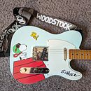 Peanuts Guitar. Un proyecto de Pintura decorativa, Música y Artesanía de Shelby Schulz - 16.01.2024