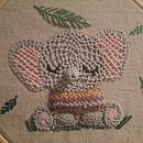 Little elephant with embroidered sweater. Embroider project by Mariana Saorli - 04.21.2025