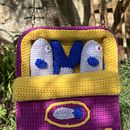 Crocheted Sardines tin bag. Un projet de Création d'accessoires, Artisanat, Crochet, DIY , et Art textile de laure_am - 29.05.2026