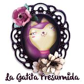 LA GATITA PRESUMIDA - Creación de logo y aplicaciones de imagen de marca para tienda online de complementos. Un proyecto de Br, ing e Identidad, Diseño gráfico e Ilustración tradicional de Julia Salinas - 24.02.2014