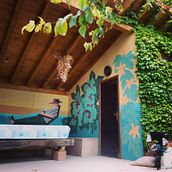 MURAL - La huerta del tío Tinín. Un progetto di Street Art, Illustrazione tradizionale e Pittura di María de la Fuente Soro - 04.07.2015