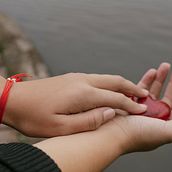 Love & Goodwill red cord bracelet . Cop, writing, Jewelr, Design, Accessor, Design, and Logo Design project by Gretel Lara - 04.11.2021