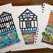 The High Street . Architectural Illustration, Architecture, Artistic Drawing, Traditional illustration, Ink Illustration, Painting, Sketchbook, and Watercolor Painting project by Emma Beebee - 04.13.2021