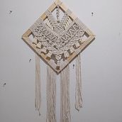 Meu projeto do curso: Introdução à tapeçaria em macramê. Un projet de Création d'accessoires, Artisanat, Art textile , et Macramé de Talita Calixto - 14.06.2021