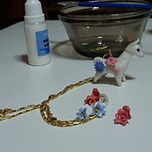 Polymer clay jewelry - alpaca with flowers. Design de acessórios, Artesanato, e Design de joias projeto de rio_magno - 28.08.2021