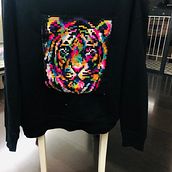 Tigre multicolor bordado en esterilla con punto cruz grande. Embroider project by paulilathrop - 01.02.2022