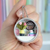 ciondolo realizzato in carta . Un progetto di Papercraft, Scultura, Design di gioielli e Creatività di giorgia ghezzi - 16.08.2022