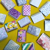 Libretas pasta doble cara enmicadas. Un projet de Design , Lettering, Papercraft , et Reliure de Cristina Gabriela Morales Martínez - 13.11.2022