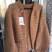 Meu projeto do curso:  Casaco de lã . Fashion Design, Fiber Arts, DIY, Crochet, and Textile Design project by Dalila Schramm - 11.25.2022