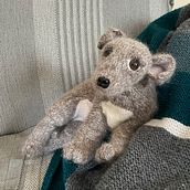 Mon projet du cours : Tricot réaliste en laine : créez un chiot en peluche. Projekt z dziedziny  Tkactwo, DIY, Dziewiarstwo Ręczne, Wzornictwo tekst i liów użytkownika Emmanuelle - 03.01.2023