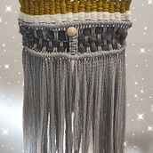 Mi proyecto del curso: Introducción al macramé: creación de un tapiz decorativo. Un projet de Création d'accessoires, Artisanat, Design d'intérieur, Décoration, Art textile, Macramé , et Design textile de Laura Moreno - 04.07.2023