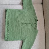 Mi proyecto del curso: Tejido de prendas infantiles con raglán top down. Een project van  Modeontwerp, Textiel, Breien y Textielontwerp van Adriana Frutos - 18.04.2023