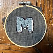 My project for course: Lettering for Embroidered Patches: Make a Wearable Statement. Un progetto di Ricamo, Cucito, DIY, Upcycling e Textile Design di Silvia Fantini - 02.05.2023
