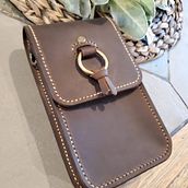 My project for course: Leatherwork: Designing and making a crossbody bag. Design, Accessor, Design, Arts, Crafts, Fashion Design, and Sewing project by jannae9 - 08.20.2023