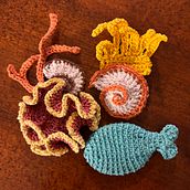 Il mio progetto del corso: Tecniche di uncinetto per flora e fauna marine. Un progetto di Design di accessori, Artigianato, Fiber Art, Uncinetto e Textile Design di zamuner001giada - 19.01.2024