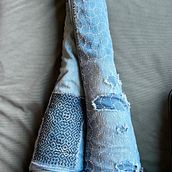 Jeans mended with sashiko stitching methods. Embroider, Fiber Arts, DIY, Upc, cling, and Textile Design project by Adrienne R - 01.21.2024