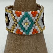Mi proyecto del curso: Diseño de accesorios con cuentas: teje patrones elegantes. Un progetto di Design di accessori, Artigianato, Design di gioielli e Fiber Art di Mariela Paola Vadalá - 16.04.2024