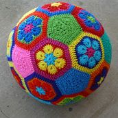 African Flower Soccer Ball. Crochet, Sculpture, and Fiber Arts project by Leslie Stahlhut - 05.22.2024