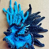 Mon projet du cours : Techniques de crochet pour représenter la vie marine. Un progetto di Design di accessori, Artigianato, Fiber Art, Uncinetto e Textile Design di alice_laperche - 10.07.2024