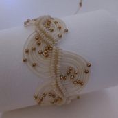 Mi proyecto del curso: Joyería en macramé. Un projet de Artisanat, Design de bijoux, Art textile, Macramé , et Design textile de Astrid Barreiro - 13.07.2024