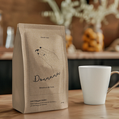 Embalagem | Café Donnana. Un projet de Packaging, Br et ing et identité de Flavia Oliveira - 15.09.2024