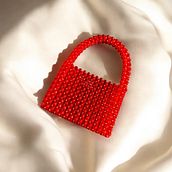 Mi proyecto del curso: Diseño y elaboración de bolsos con cuentas. Un proyecto de Diseño de complementos, Artesanía, Diseño, Diseño de moda y Tejido de Alondra Carazas Mendoza - 30.09.2024