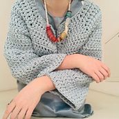 Caro&varie - Top Down: cardigan marshmallow. Een project van DIY, Haken,  Modeontwerp y Textielontwerp van Caterina Bassoli - 28.12.2024