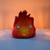 Portacandele Calcifer. Un progetto di Ceramica, Pittura acrilica e Artigianato di Laryssa Ferreira - 19.06.2025