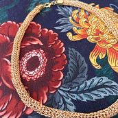 Colar e pulseira feitas em crochê com fio de cobre. Crochet, DIY, Fashion Design, Fiber Arts, Textile Design, Arts, and Crafts project by Gabriela Pacheco Ferreira - 09.19.2025