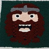 Almohadon Vikingo . Een project van Borduurwerk,  Interieurdecoratie, Punch needle y Textielontwerp van Jennifer Araneda - 26.10.2025