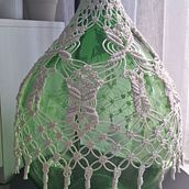 Rivestimento di una damigiana in macramè. Decoration, Accessor, Design, Interior Design, Macramé, Fiber Arts, and Textile Design project by Annalaura Giannelli - 12.28.2025