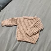 Suéter baby. Fashion Design, DIY, Fiber Arts, Crochet, and Textile Design project by Priscila Campos - 01.05.2026