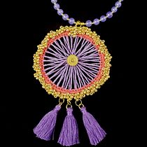 My project in Woven Jewelry with Natural Fibers course