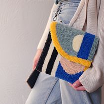 Punch needle bag with geometric design