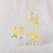 Pendientes flor amarilla en resina