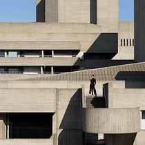 Solitary Figure in Brutalist Geometry