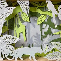 Forêt tropicale en paper cut layered
