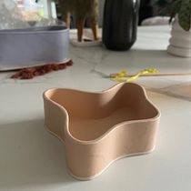 Bowls and wobbly vase