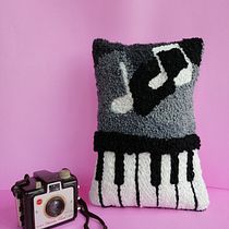 Minicojin musical . Un projet de Artisanat, Couture, Créativité , et Décoration de camilapaz_alvareza - 15.07.2020